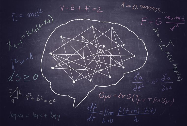 Blackboard drawing of a brain and science formulas