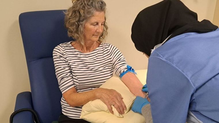Nurse taking blood from a patient