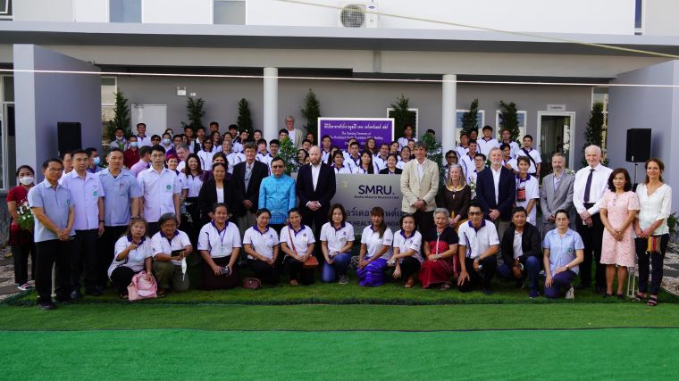 Group photo in front of New SMRU building
