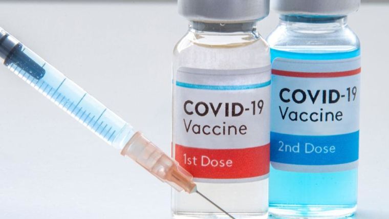 Needle and two vaccine vials